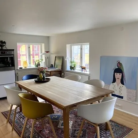 I Den Gamle Kobmandsgard *